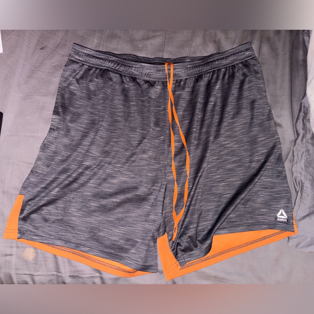 sold Reebok Athletic Shorts in Charcoal and Tangerine